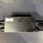 1438067 Клапан противодавления гидромотора хода Caterpillar